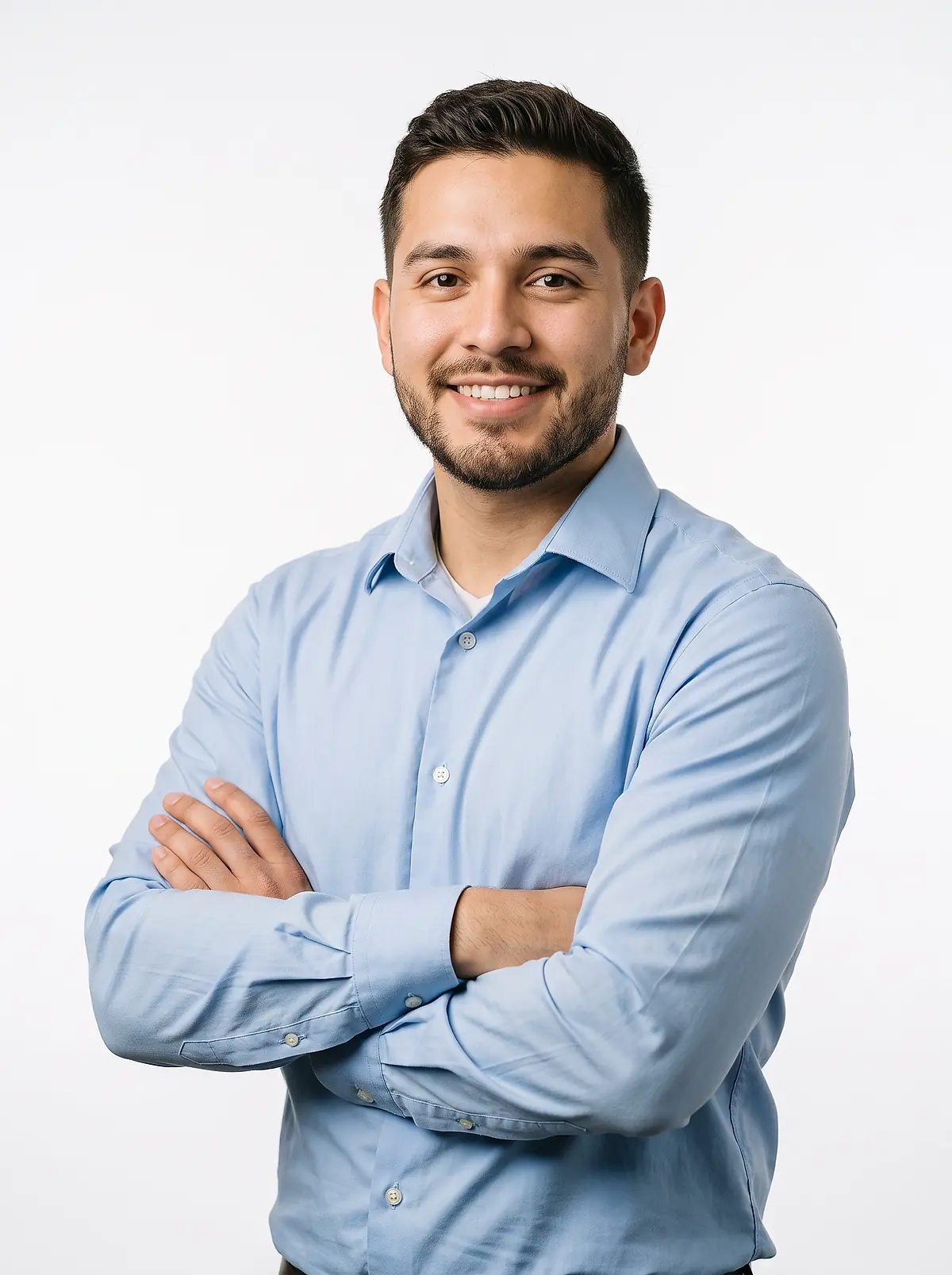 An accounting associate in a light blue shirt smiling in the office.